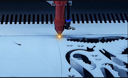 mesin laser cutting CO2